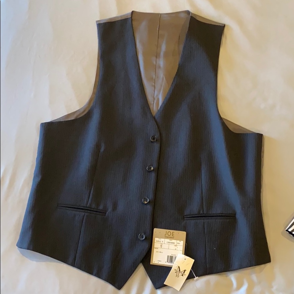 Man vest never used, tag still on